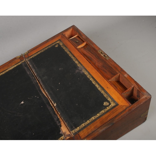 204 - A Victorian mahogany writing box, with leather insert, pen tray, inkwell and storage. Height: 18cm, ... 