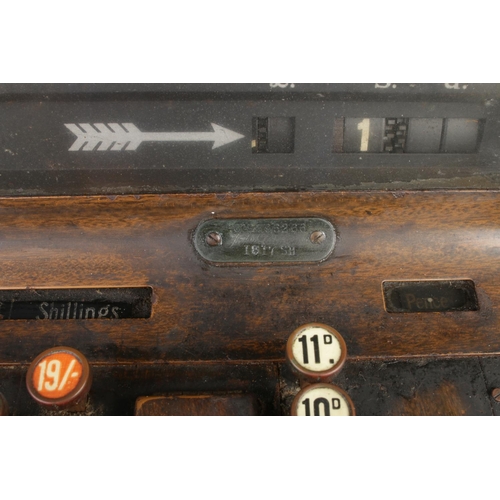 209 - An early Twentieth Century National Cash Register; 1817 SE. With scumble glaze steel frame, crank ha... 