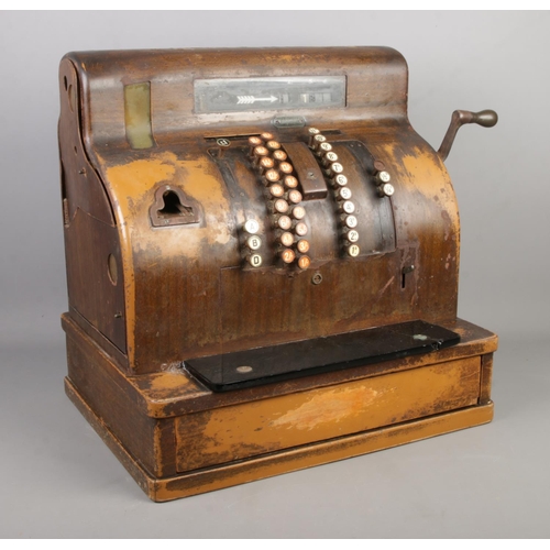 209 - An early Twentieth Century National Cash Register; 1817 SE. With scumble glaze steel frame, crank ha... 