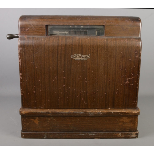 209 - An early Twentieth Century National Cash Register; 1817 SE. With scumble glaze steel frame, crank ha... 