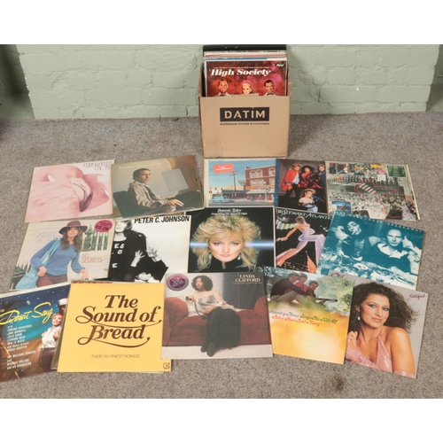 282 - A box of LP records. Includes Bonnie Tyler, Rod Stewart, Heart, Billy Joel, David Essex, etc.