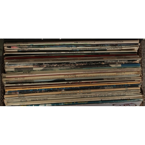 282 - A box of LP records. Includes Bonnie Tyler, Rod Stewart, Heart, Billy Joel, David Essex, etc.