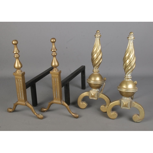 364 - Two pairs of brass firedogs, one with conical swirl design. Tallest: 38cm.