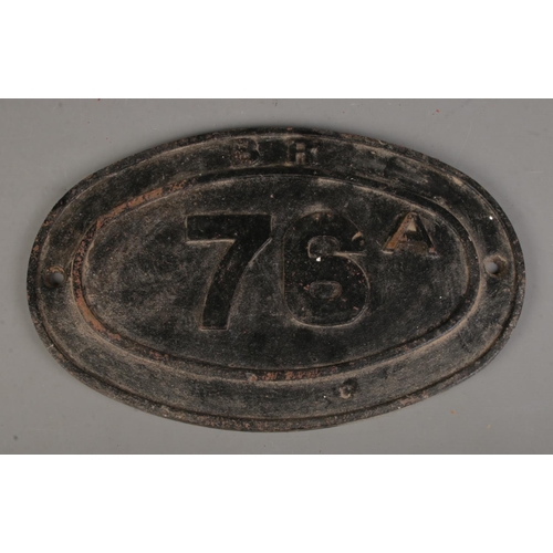 368 - A British Railway cast iron bridge plate, 76A. Widest diameter: 45cm.