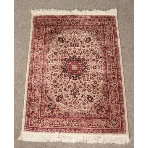 406 - A small Isfahan Collection red ground rug with central medallion motif and floral decoration (145cm ... 