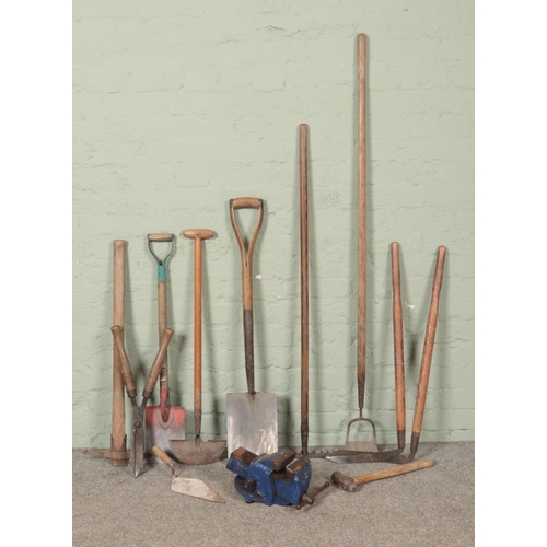 465 - A quantity of wooden handle garden tools, including rake, hoe, shears and shovel, together with a Re... 