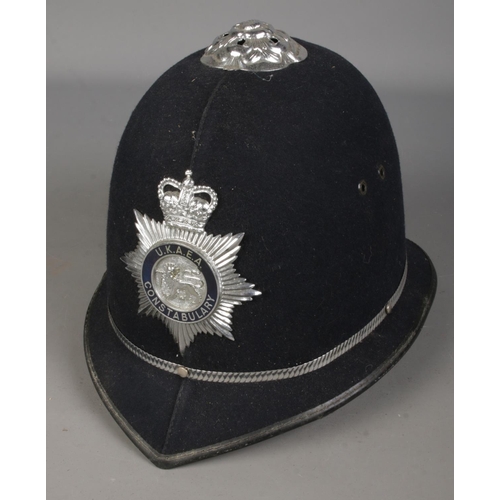 66 - A U.K.A.E.A Constabulary police helmet.