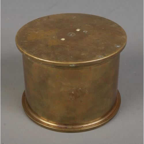 73 - A WWI trench art shell jar and cover, composed of two 4.5 Howitzer cases dated 1916 and 1917. The ba... 