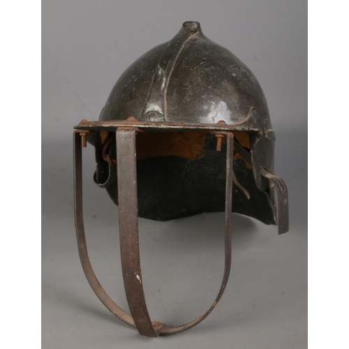 86 - A reproduction fibreglass Zischagge 'Lobster Tailed' pot helmet.