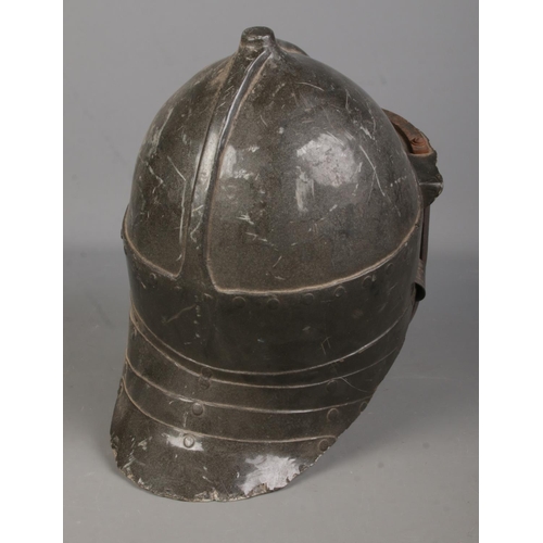 86 - A reproduction fibreglass Zischagge 'Lobster Tailed' pot helmet.