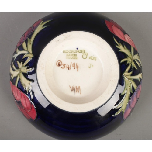 567 - A Moorcroft pottery bowl in the Anemone design. Diameter (16cm)