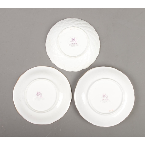 576 - A collection of Rockingham porcelain teawares in three designs, including 876 and 1500 patterns. The... 