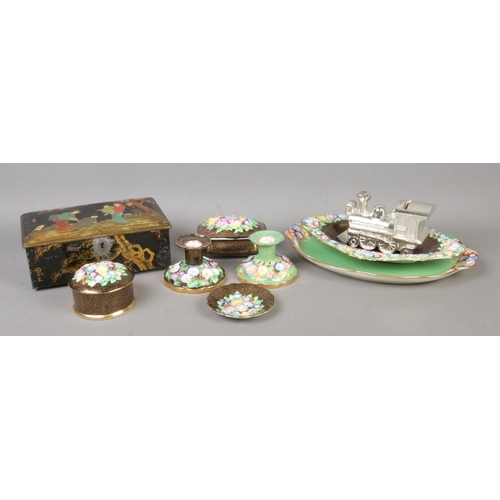 256 - A collection of assorted items, to include Tuscan China dressing table set, chromed money box and to... 