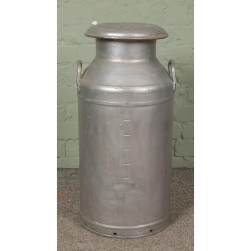 376 - A Grundy Teddington Ltd twin handled milk churn. 73cm tall.