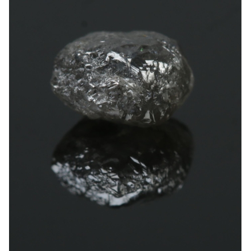 547 - A rough/uncut diamond stone. Approximately 1ct.