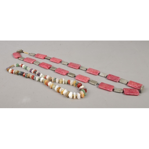 555 - Two polished hardstone necklaces. Length unclasped: 77cm and 44cm.