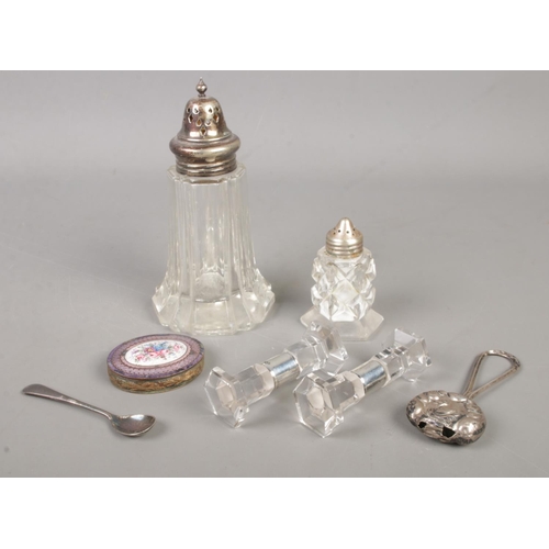 583 - A collection of silver and silver plated mounted items, to include a pair of silver and glass knife ... 