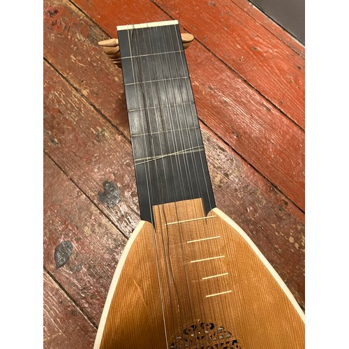 396 - A cased eight course/15 string lute.