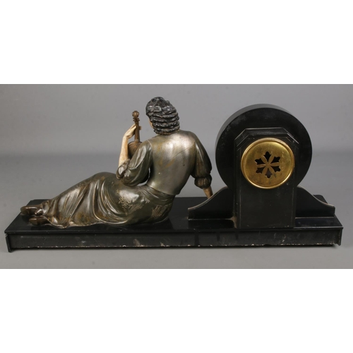 109 - A large Art Nouveau style slate figural mantel clock. Formed as a seated maiden holding a violin. (3... 