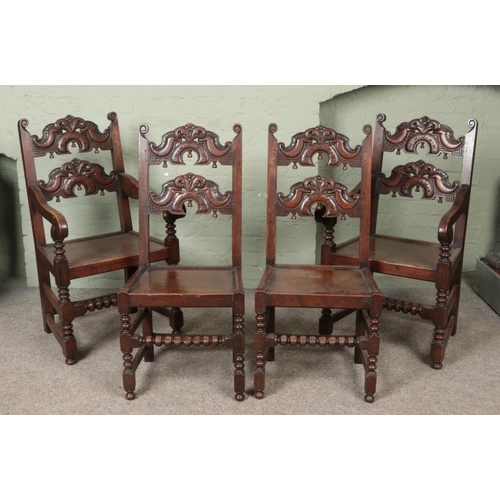 555 - A set of eight oak chairs. Having carved backs, jointed construction and bobbin turned stretchers. H... 