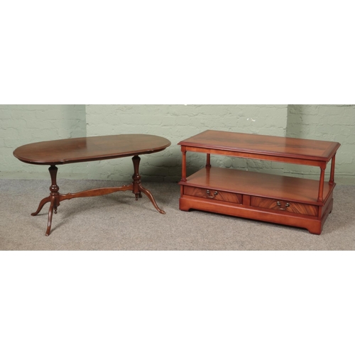 573 - Two coffee tables, to include mahogany quarter veneered and two tier example with lower drawers.