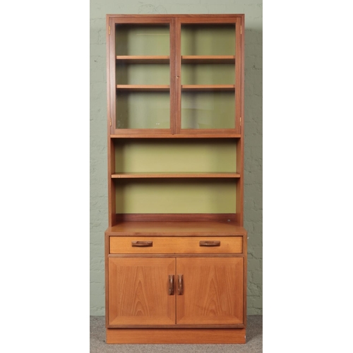 587 - A G Plan 'Sierra' slim wall unit, with display cabinet and cupboard base. Height: 198cm, Width: 84cm... 