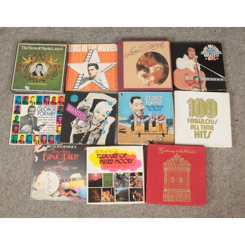 107 - A collection of records including Elvis Presley Greatest Hits, Elvis In The Movies, The Best Of Mari... 