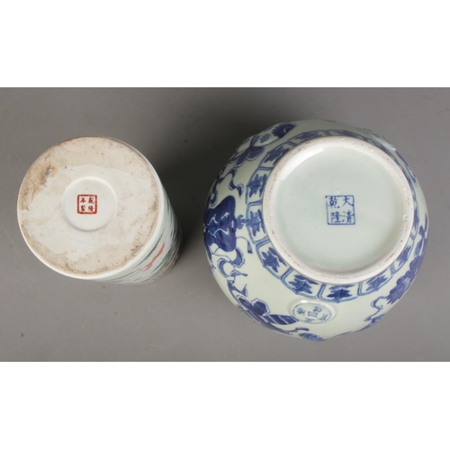 165 - Two Chinese porcelain vases. Includes hand painted sleeve vase and a blue & white example. Both with... 