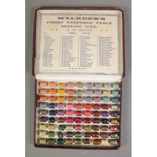 172 - An early 20th century Walkden's Finest Perfumed Fancy Wax display case in 75 shades.