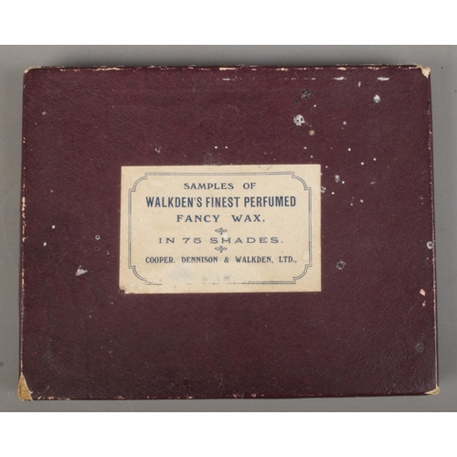 172 - An early 20th century Walkden's Finest Perfumed Fancy Wax display case in 75 shades.