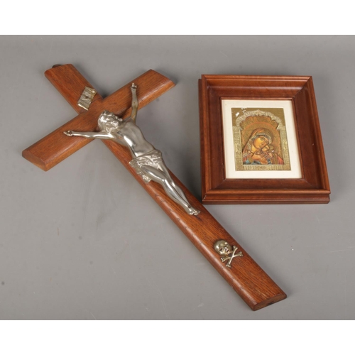 175 - A framed icon plaque along with a large crucifix.