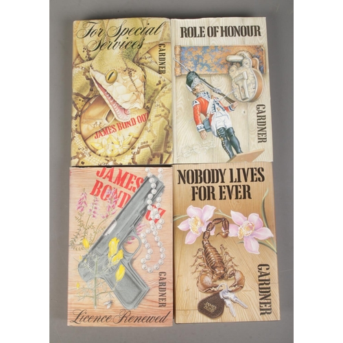 182 - John Gardner, four 1st edition James Bond novels with dust covers. Includes Role of Honour, Licence ... 