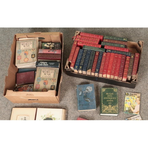 187 - Two boxes of assorted modern and vintage books to include Ladybird, The Great World War: A History, ... 