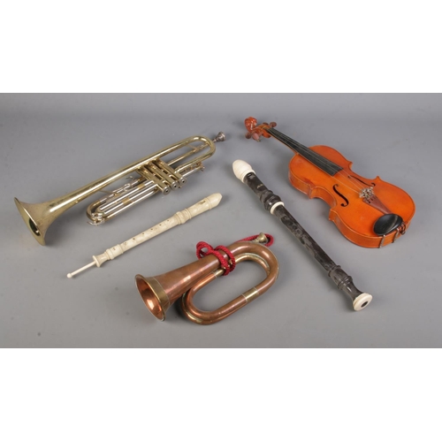 198 - A collection of musical instruments to include copper hunting horn, two recorders, Stentor student v... 