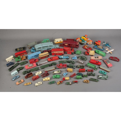 219 - A large quantity of diecast vehicles mostly Dinky and Lesney examples.