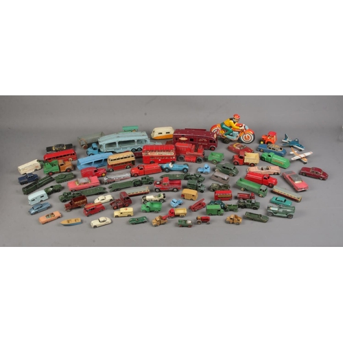 219 - A large quantity of diecast vehicles mostly Dinky and Lesney examples.