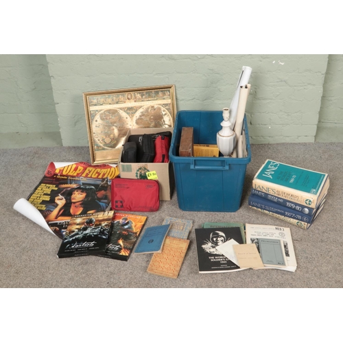 238 - Two boxes of miscellaneous to include character modelling guides, reproduction posters, framed wall ... 