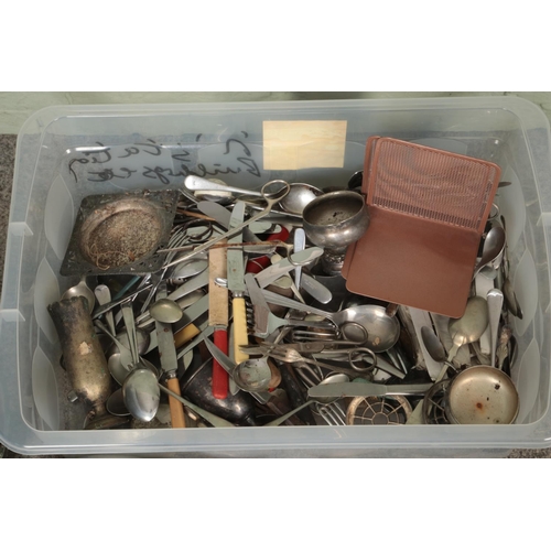 242 - A box of metalwares. Includes copper & brass bugle, jam pan, cutlery, casters, companion set, rabbit... 