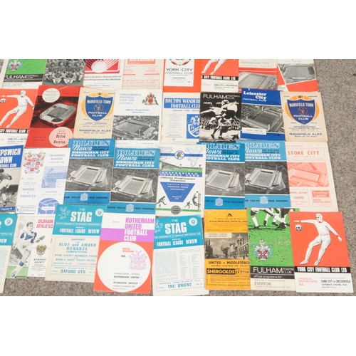 256 - An extremely large collection of assorted 1960's football programmes, to include Manchester United, ... 