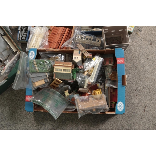 288 - Three boxes of model railway accessories. Includes Hornby platform straights and station buildings, ... 