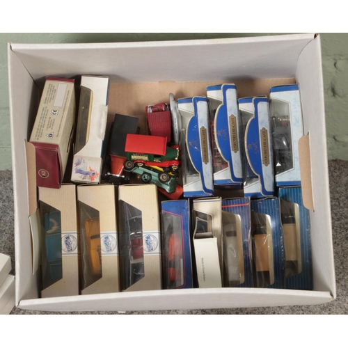 291 - A box of assorted diecast vehicles to include Days Gone, Tetley, Lledo, etc.