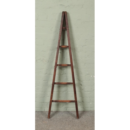 305 - A five rung wooden A-Frame ladder, possibly for fruit picking. Height: 150cm.