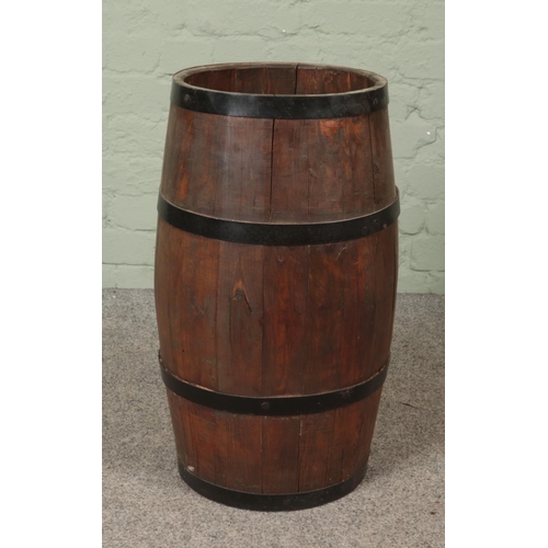 310 - A pine and metal bound barrel 

Hx63cm