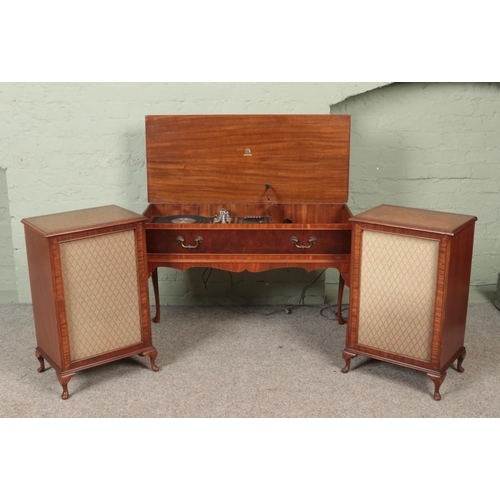 320 - A Dynatron walnut radiogram along with two matching speakers. Having Goldring G101 turntable.