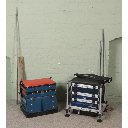 324 - A collection of fishing equipment, consists of two two-piece rods and seat tackle boxes, including D... 