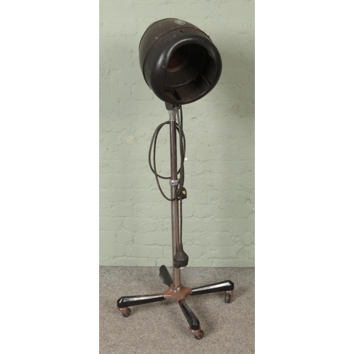 327 - A vintage Eugene chrome and bakelite hood hair dryer.