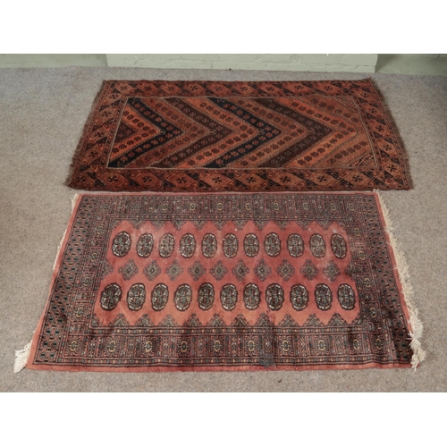 328 - Two wool rugs. Includes Bokhara and Gendje style examples.