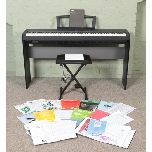 330 - A Yamaha P-35 Digital Piano, on stand with stool, with additional LP5A foot pedal. Complete with ins... 