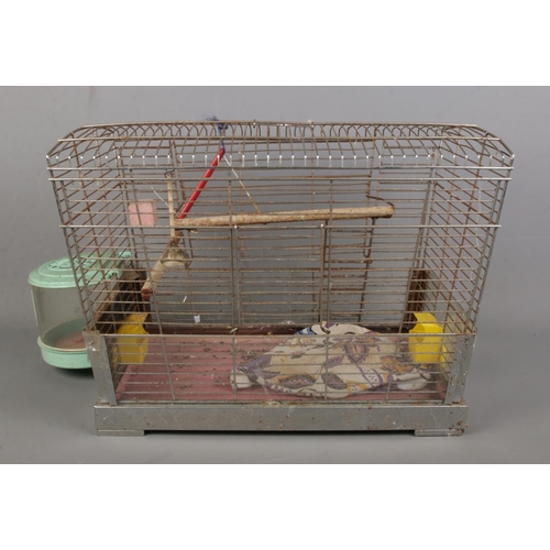 332 - A vintage bird cage. (35cm x 58cm x 33cm)