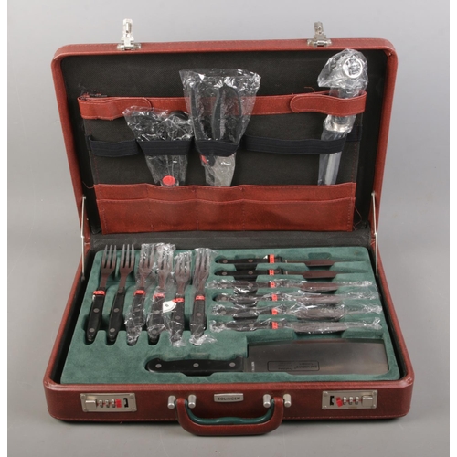 349 - A complete Bachmayr Solingen knife set in lockable case.